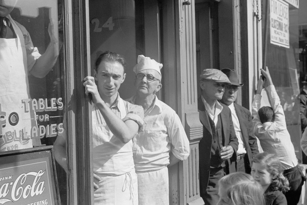 Solomon Hess SBA Loan Fund – Men outside shop